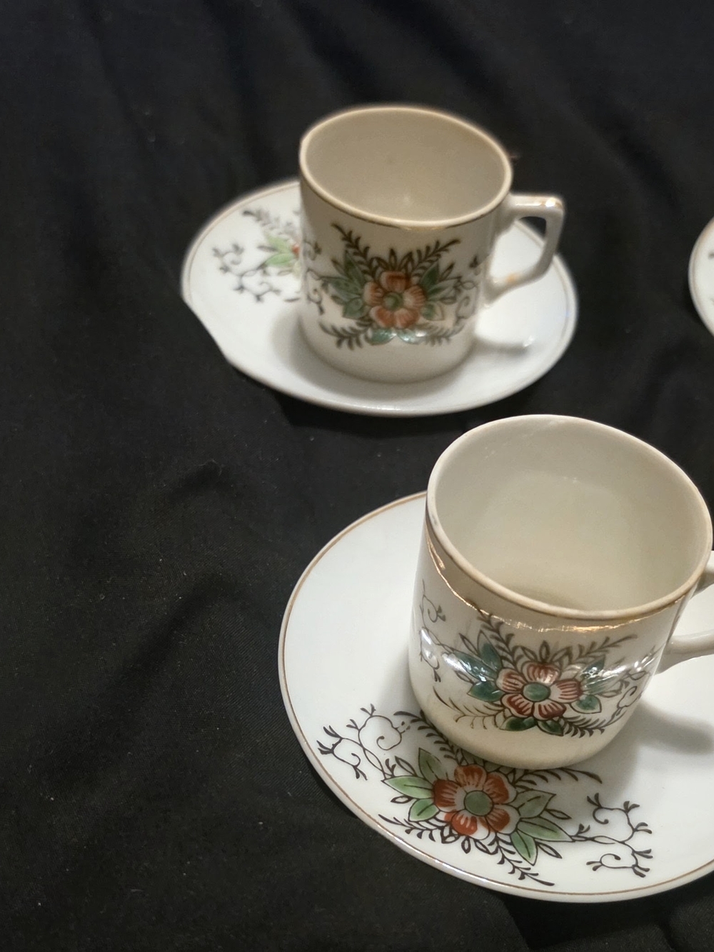Vintage Floral Porcelain Cup and Saucer Set - Cream with Green & Orange Accents
